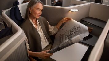 Passenger seated in Lufthansa Allegris business cabin