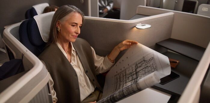 Passenger seated in Lufthansa Allegris business cabin