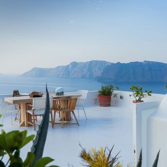 Santorini terrace overlooking the caldera and sea