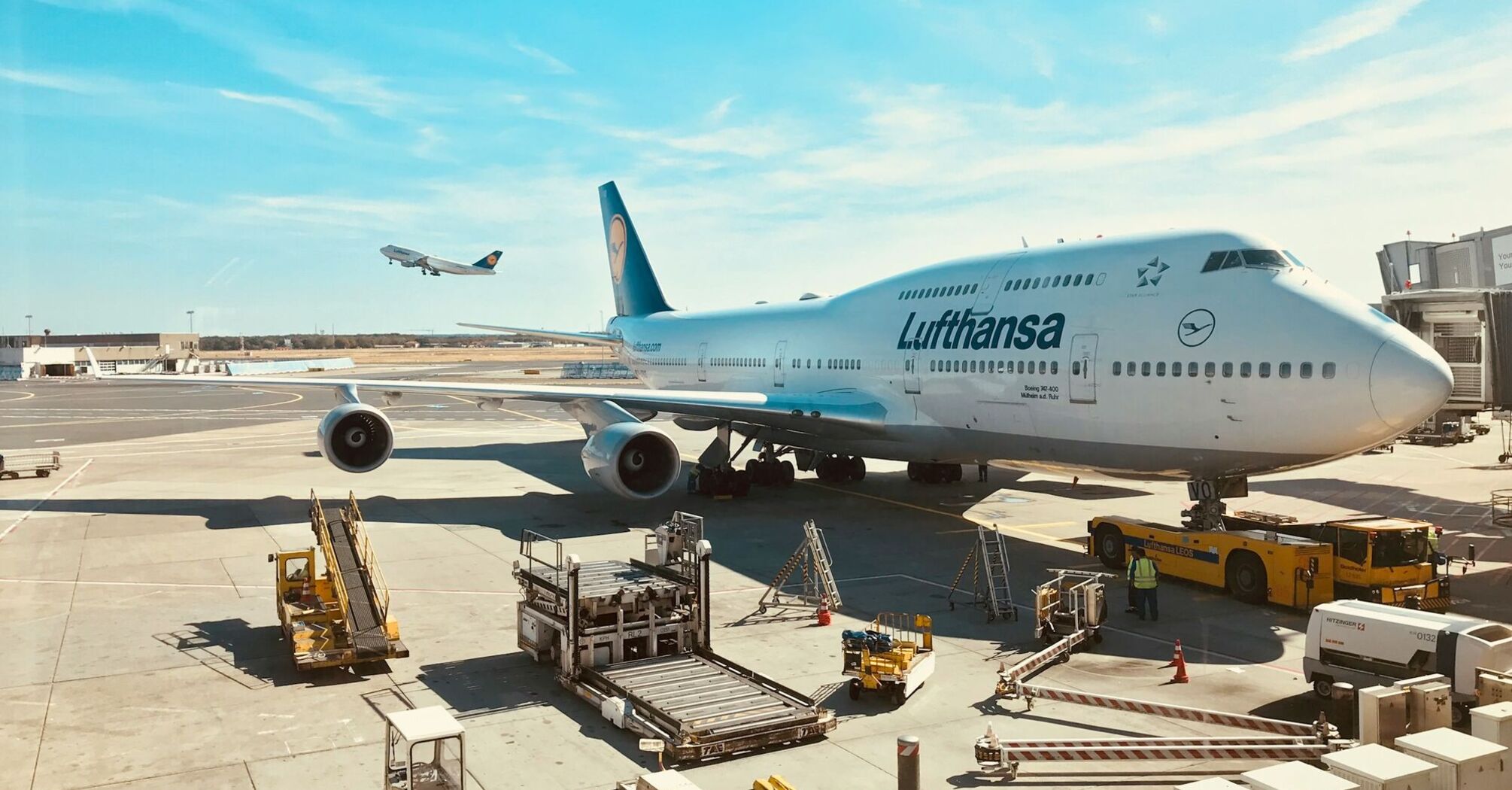 Lufthansa aircraft parked at an airport gate