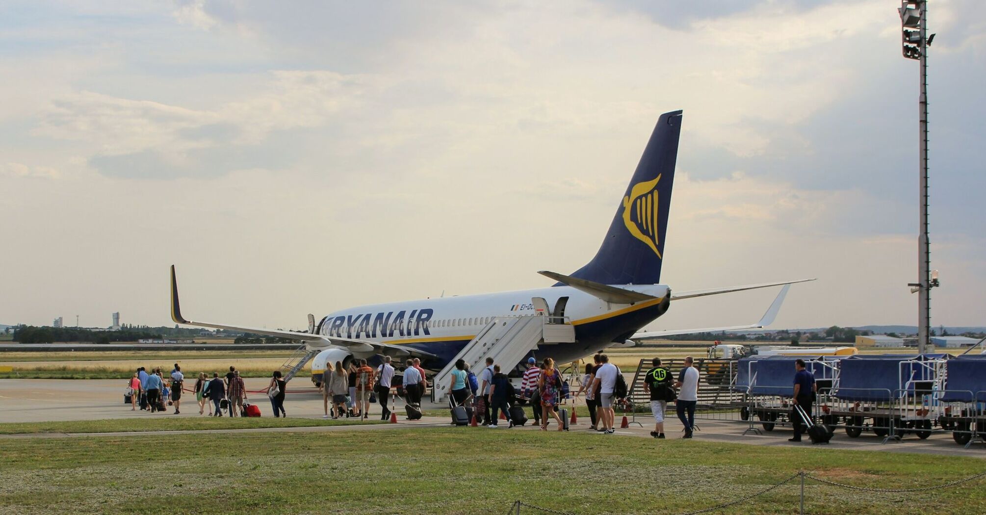 Passengers boarding a Ryanair aircraft at the airport
