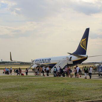 Passengers boarding a Ryanair aircraft at the airport