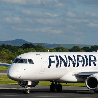 Finnair aircraft taxiing on a runway