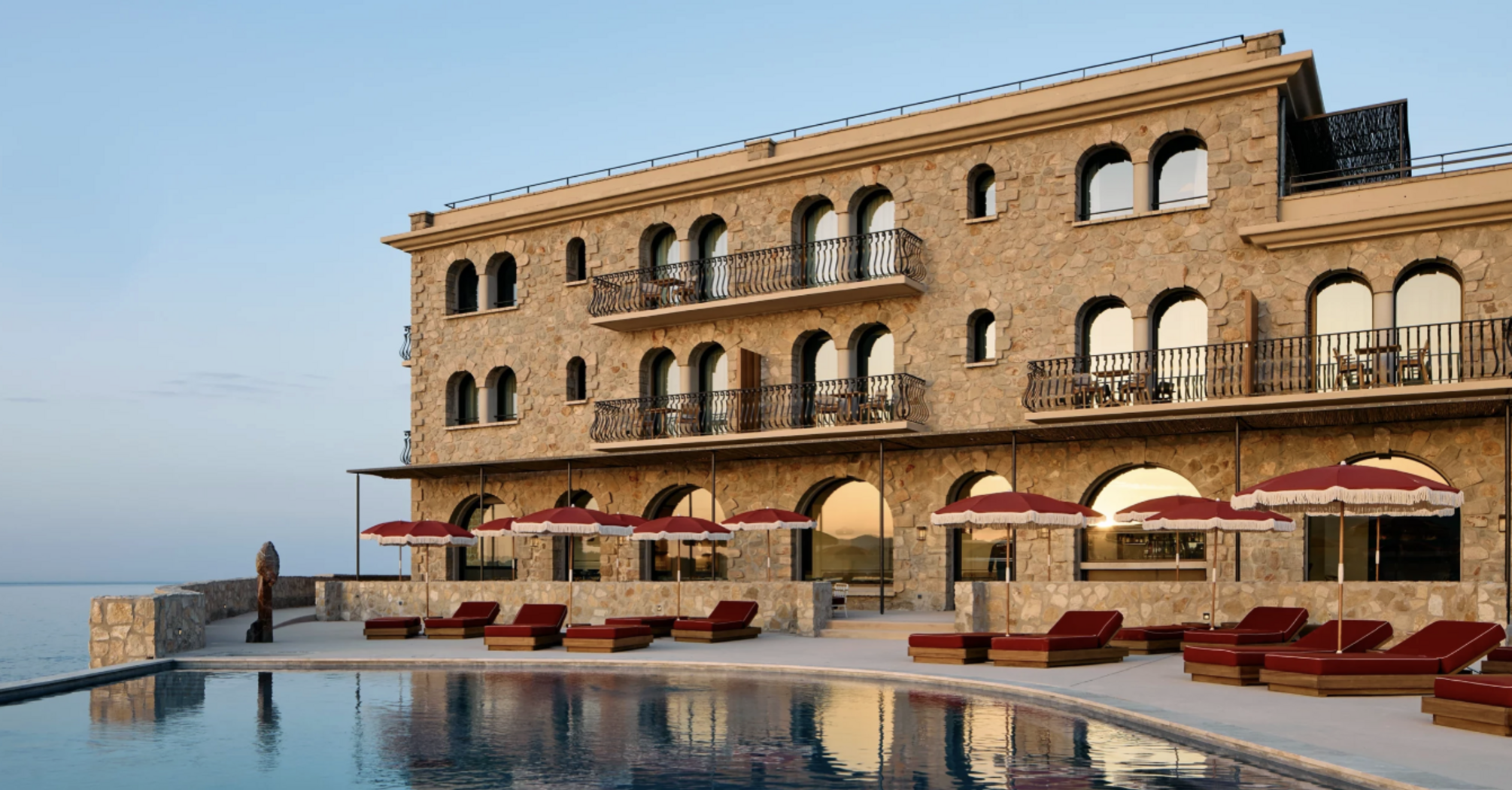 Zannier Île de Bendor hotel exterior with pool overlooking the sea