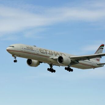 Etihad Airways aircraft flying in a clear sky