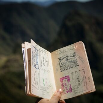 Open passport with Machu Picchu stamp
