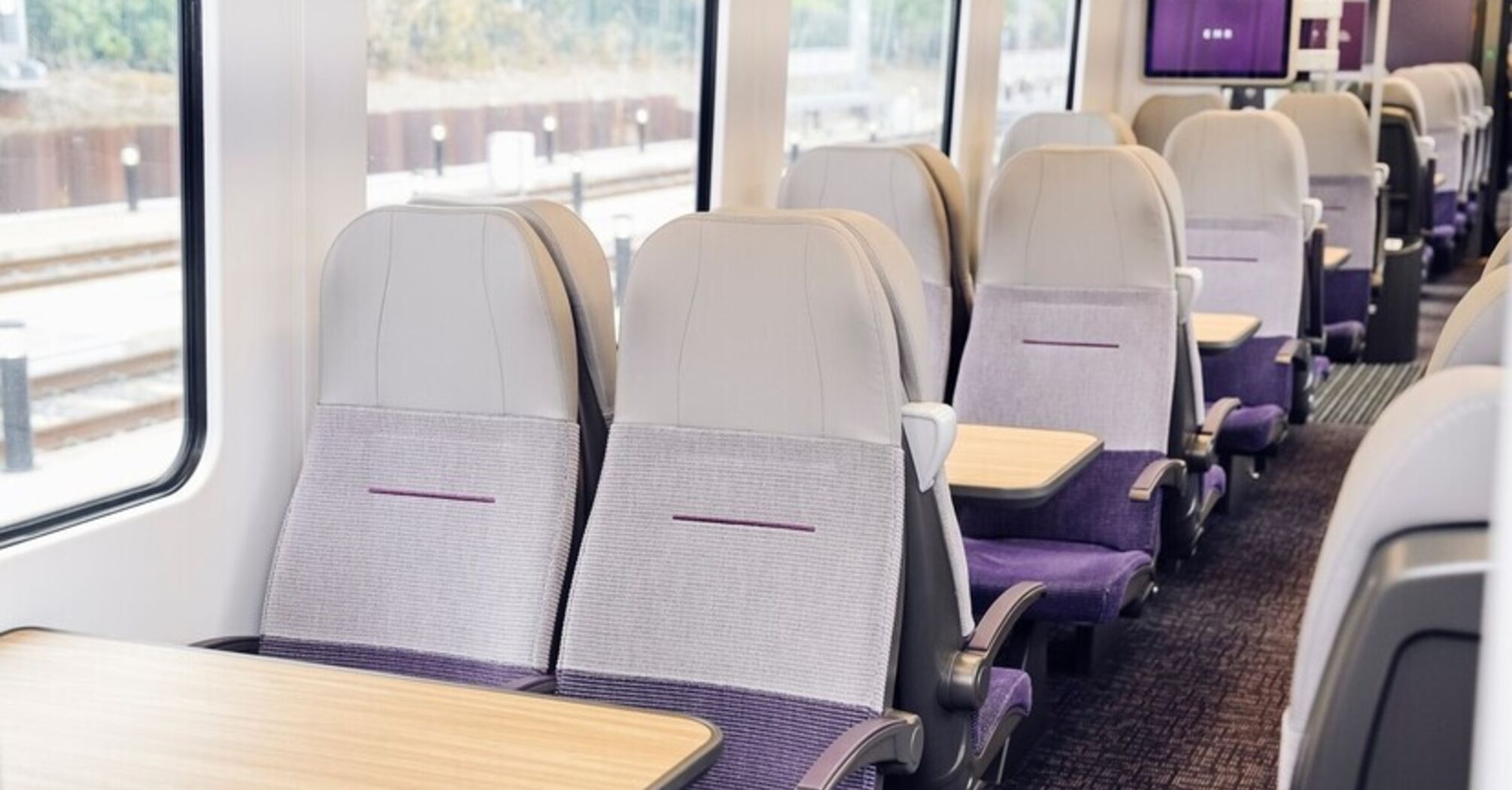 Refurbished train seats inside a Luton Airport Express carriage