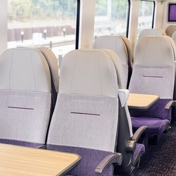 Refurbished train seats inside a Luton Airport Express carriage