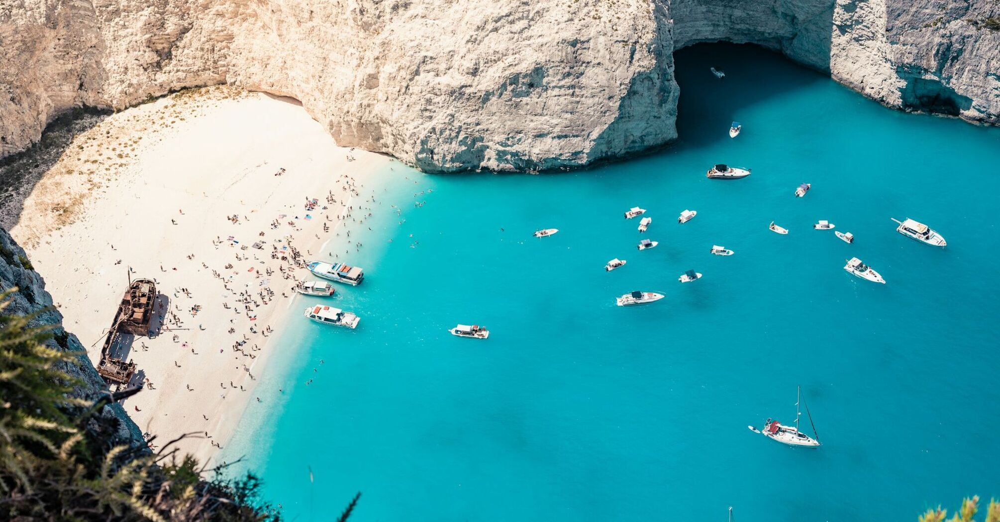 Shipwreck Beach in Zante with turquoise water and boats