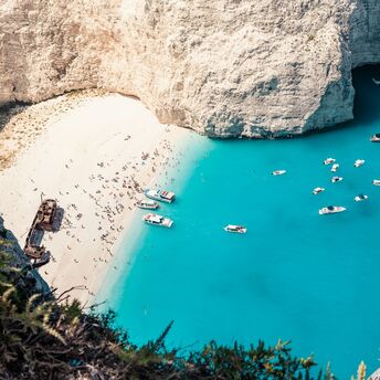Shipwreck Beach in Zante with turquoise water and boats