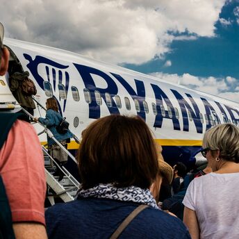 Passengers boarding a Ryanair aircraft