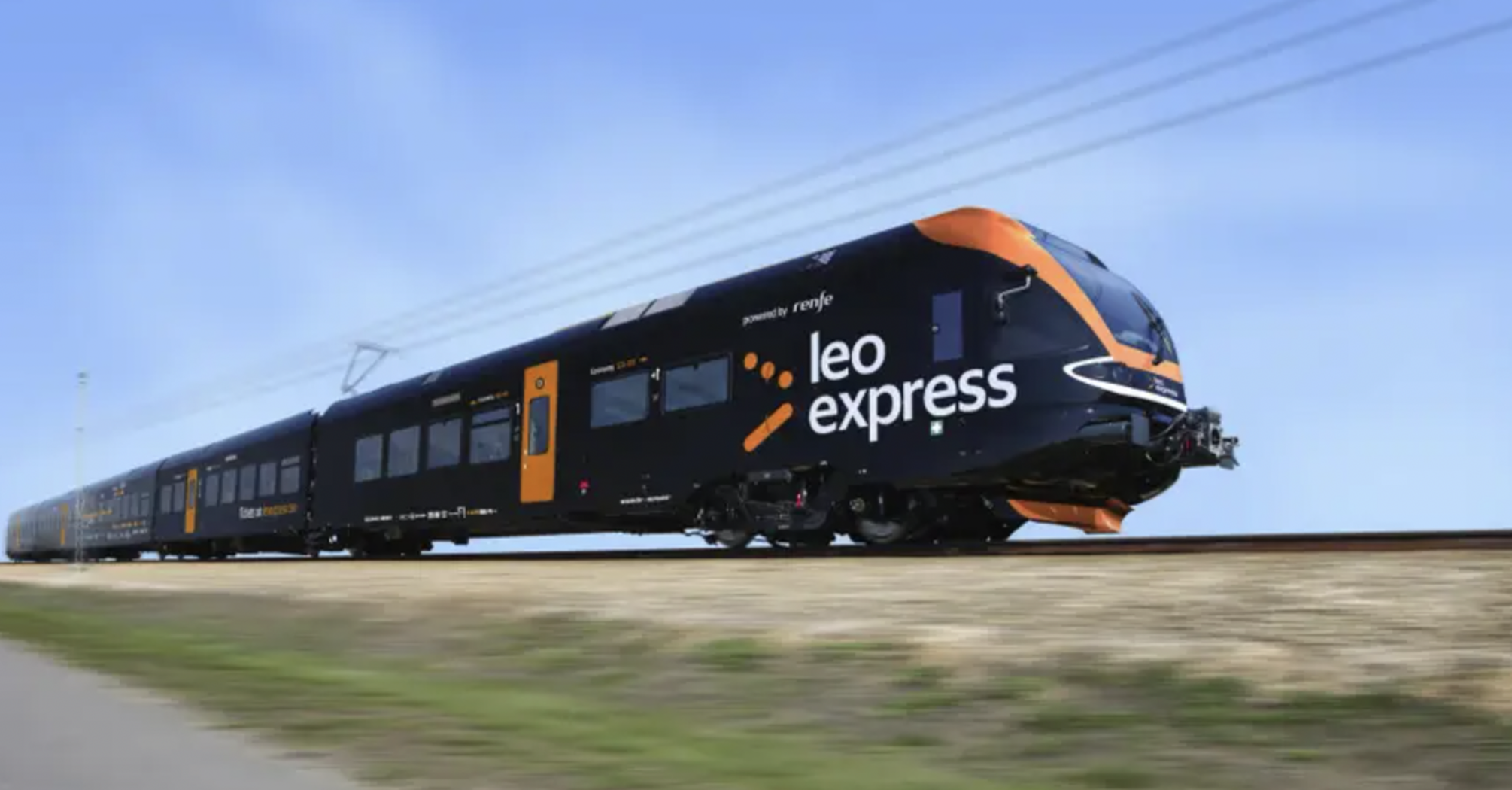 Leo Express train travelling on railway tracks
