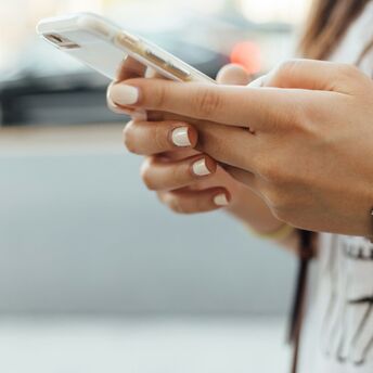 Traveller using a smartphone before posting online