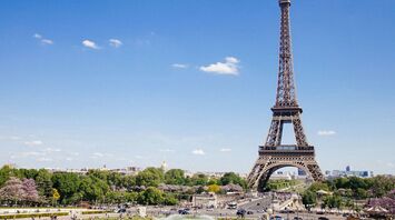 Eiffel Tower and gardens in Paris on a clear day
