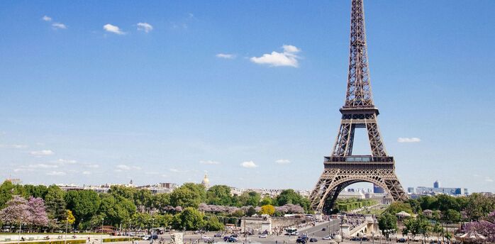 Eiffel Tower and gardens in Paris on a clear day