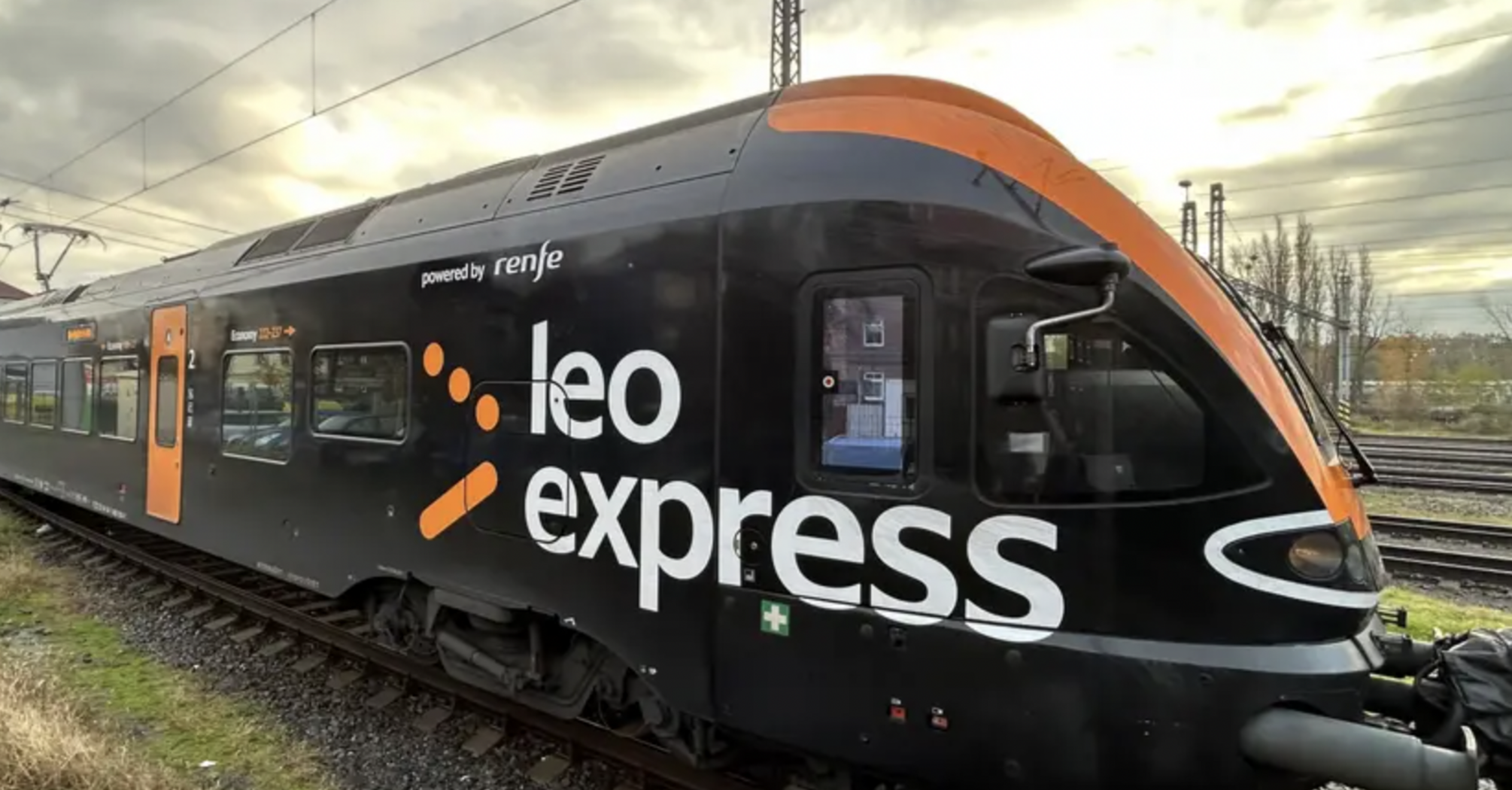 Leo Express train standing on railway tracks