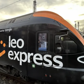 Leo Express train standing on railway tracks