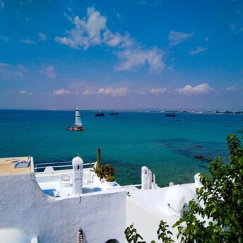 Tunisian coastline with white buildings and blue sea