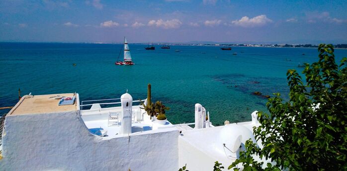 Tunisian coastline with white buildings and blue sea