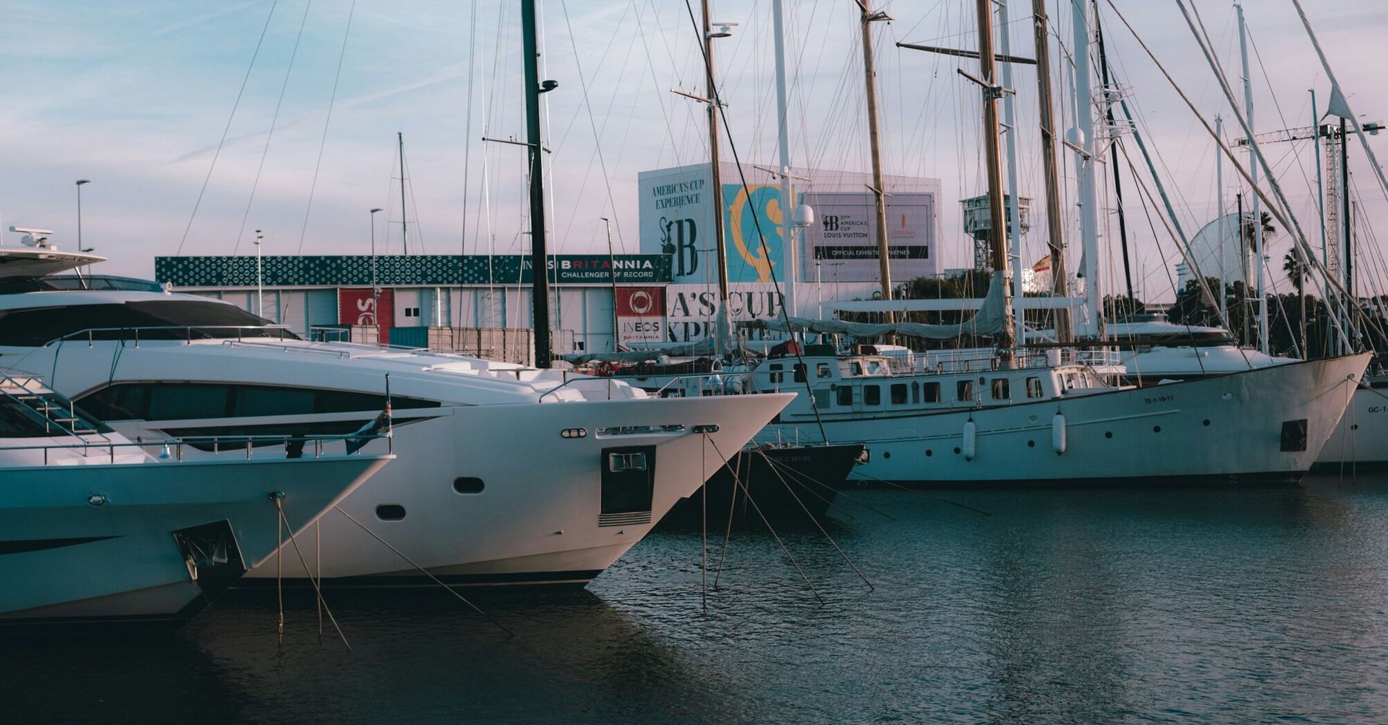 Yachts moored at Barcelona marina near the waterfront