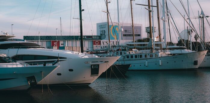Yachts moored at Barcelona marina near the waterfront
