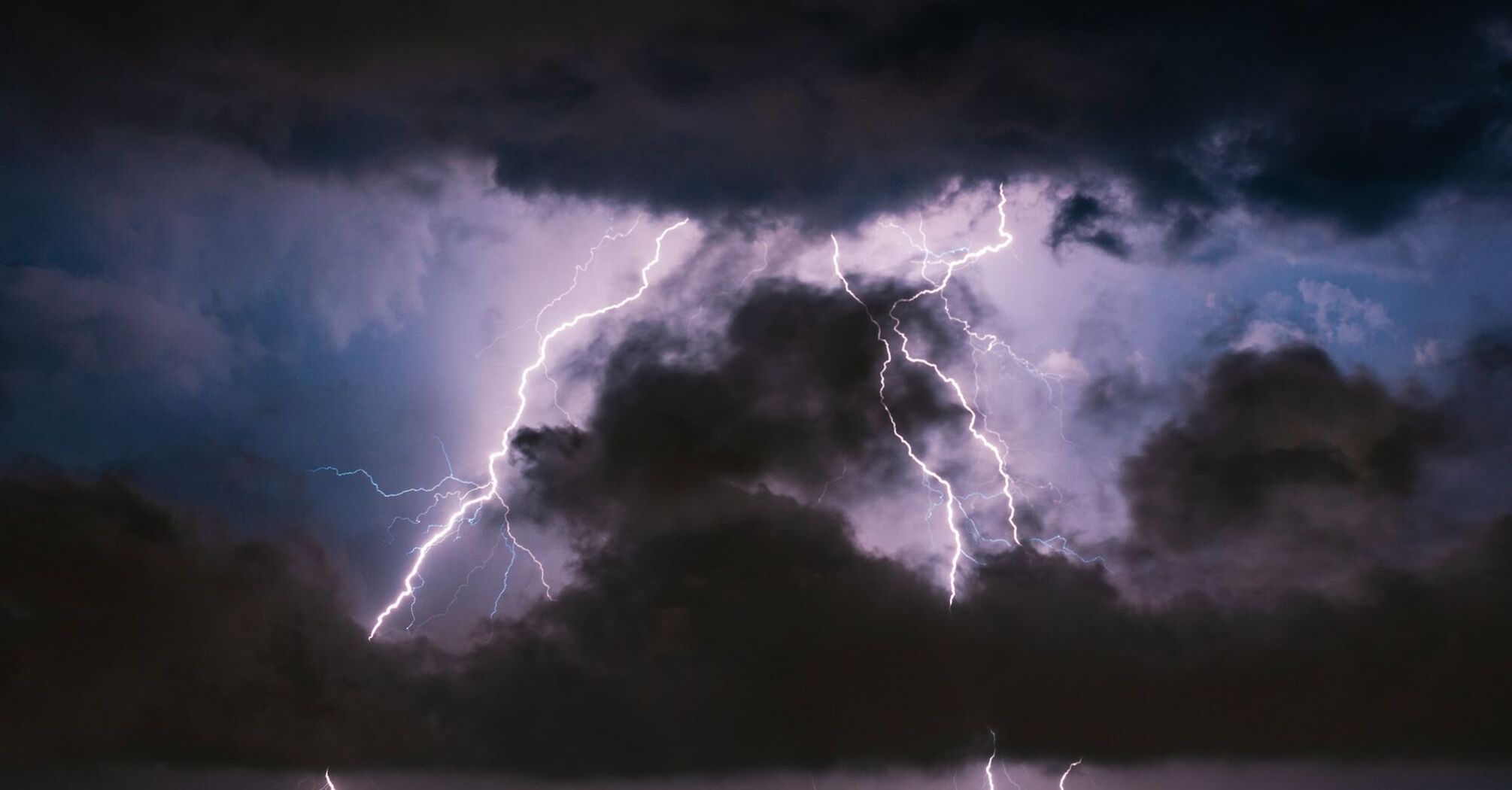 Lightning strikes during a dark thunderstorm