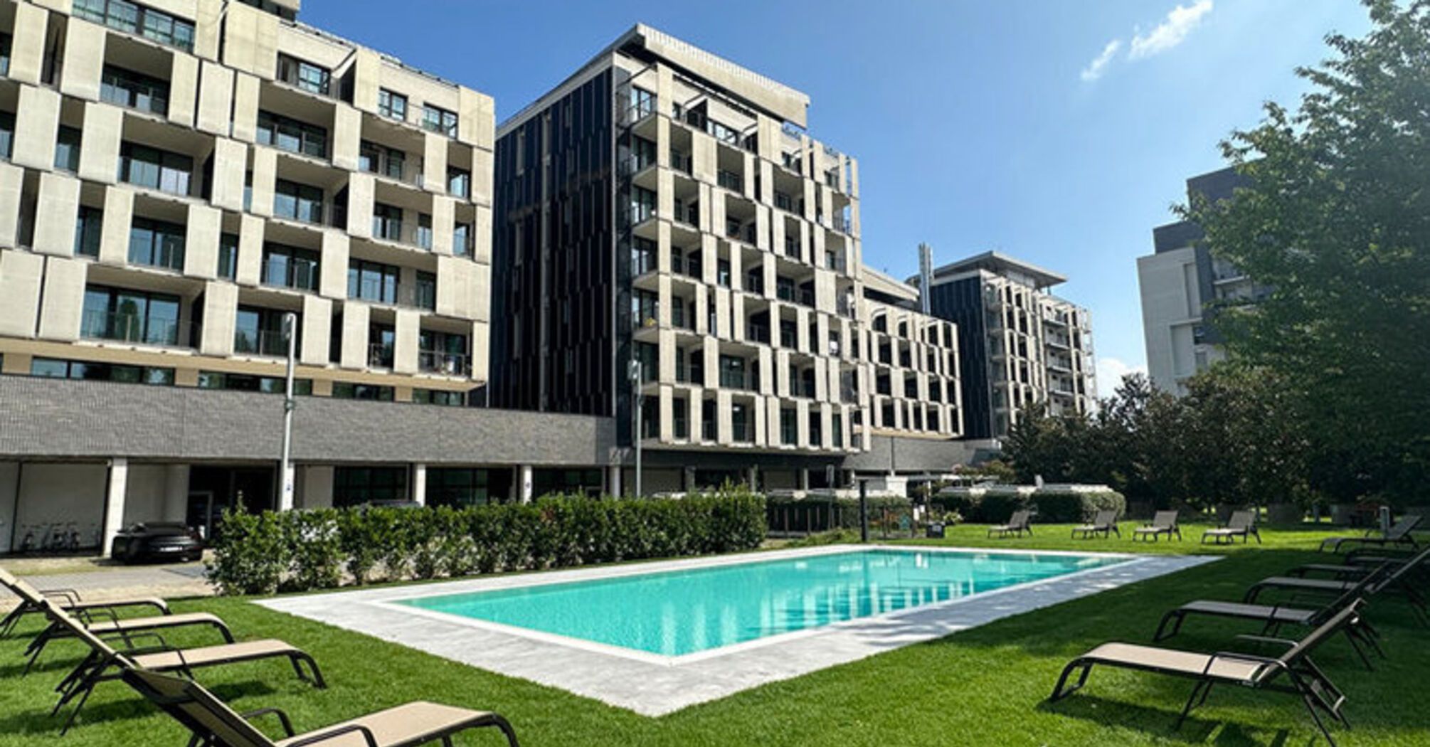 Outdoor pool at a modern hotel in Milan