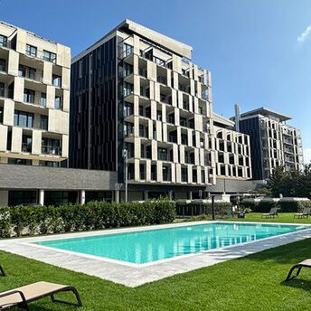 Outdoor pool at a modern hotel in Milan