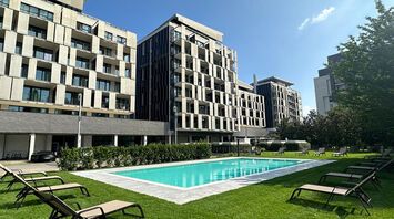 Outdoor pool at a modern hotel in Milan
