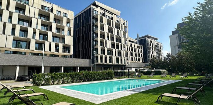 Outdoor pool at a modern hotel in Milan