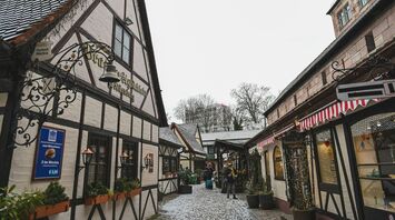 Snow-dusted half-timbered street in Nuremberg old town