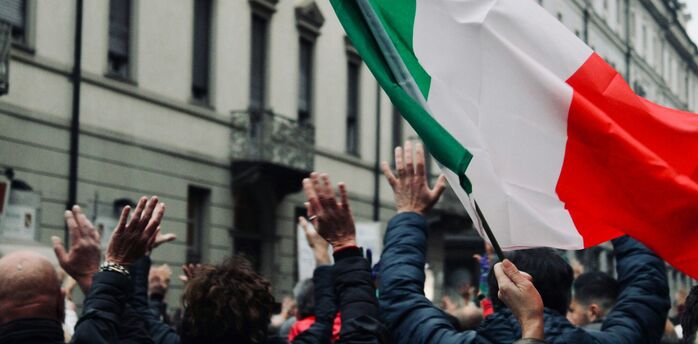 Italian flag waved during a public protest