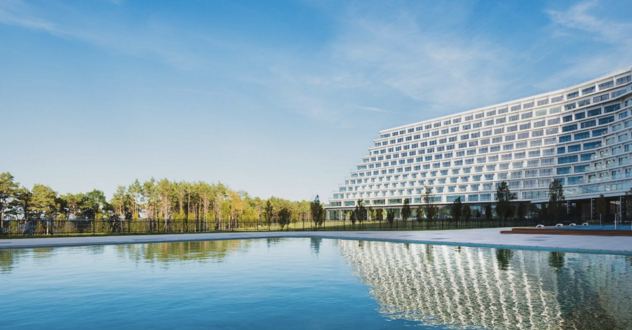 Hotel Gołębiewski Pobierowo beside a large outdoor pool