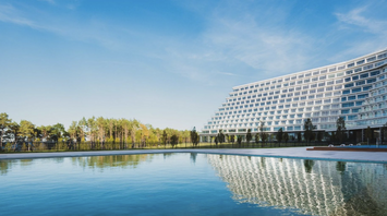 Hotel Gołębiewski Pobierowo beside a large outdoor pool
