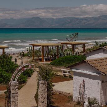 Beachfront area with cabanas on Corfu’s northern coast