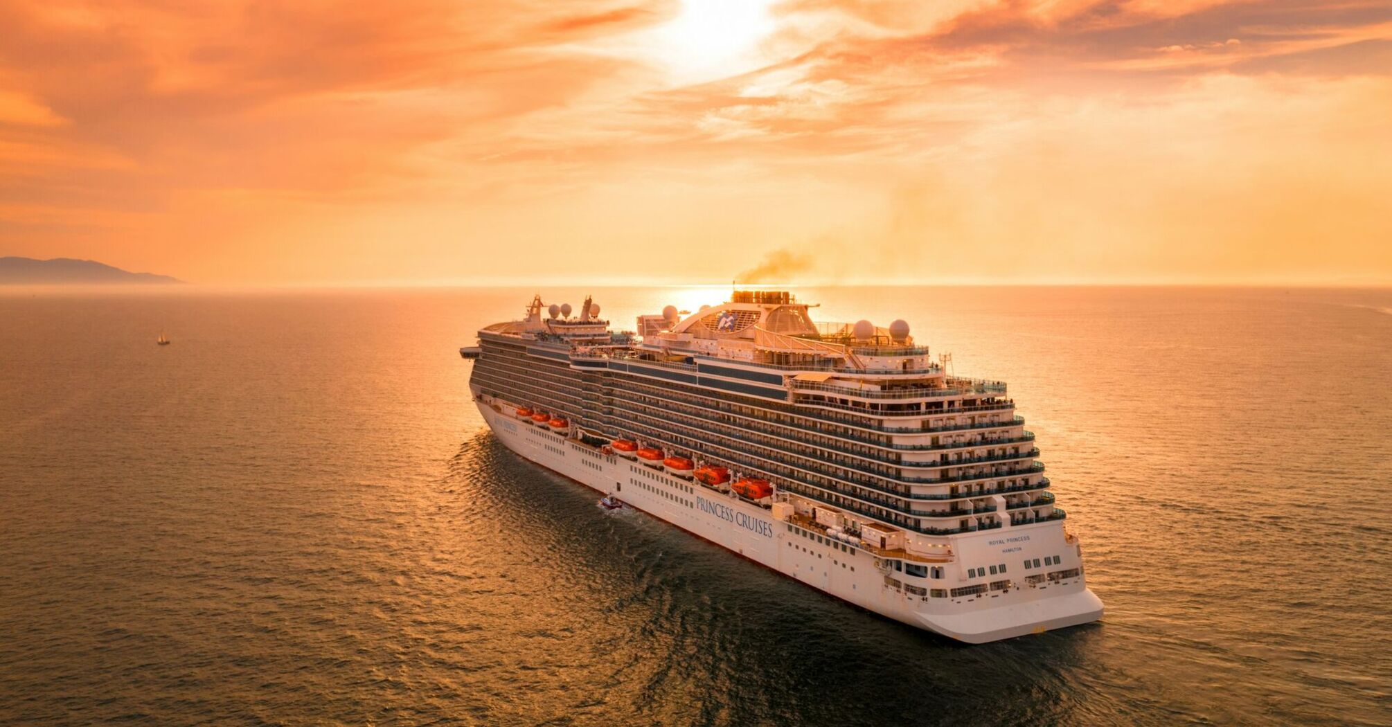 Princess Cruises ship sailing at sunset
