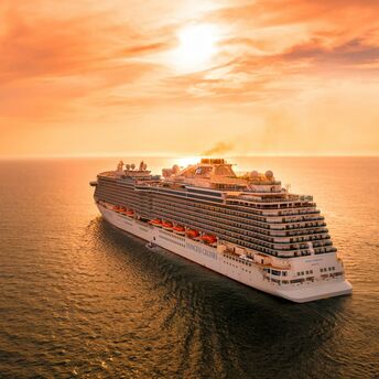 Princess Cruises ship sailing at sunset