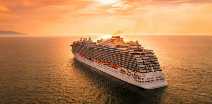Princess Cruises ship sailing at sunset