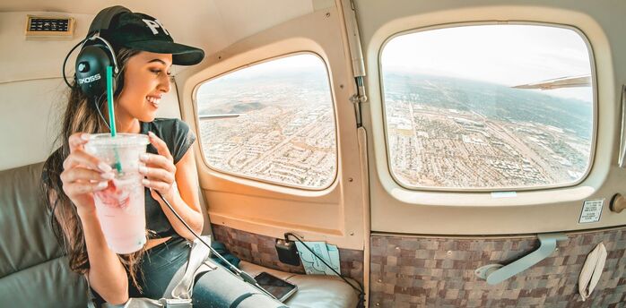 Passenger wearing casual clothes during a flight