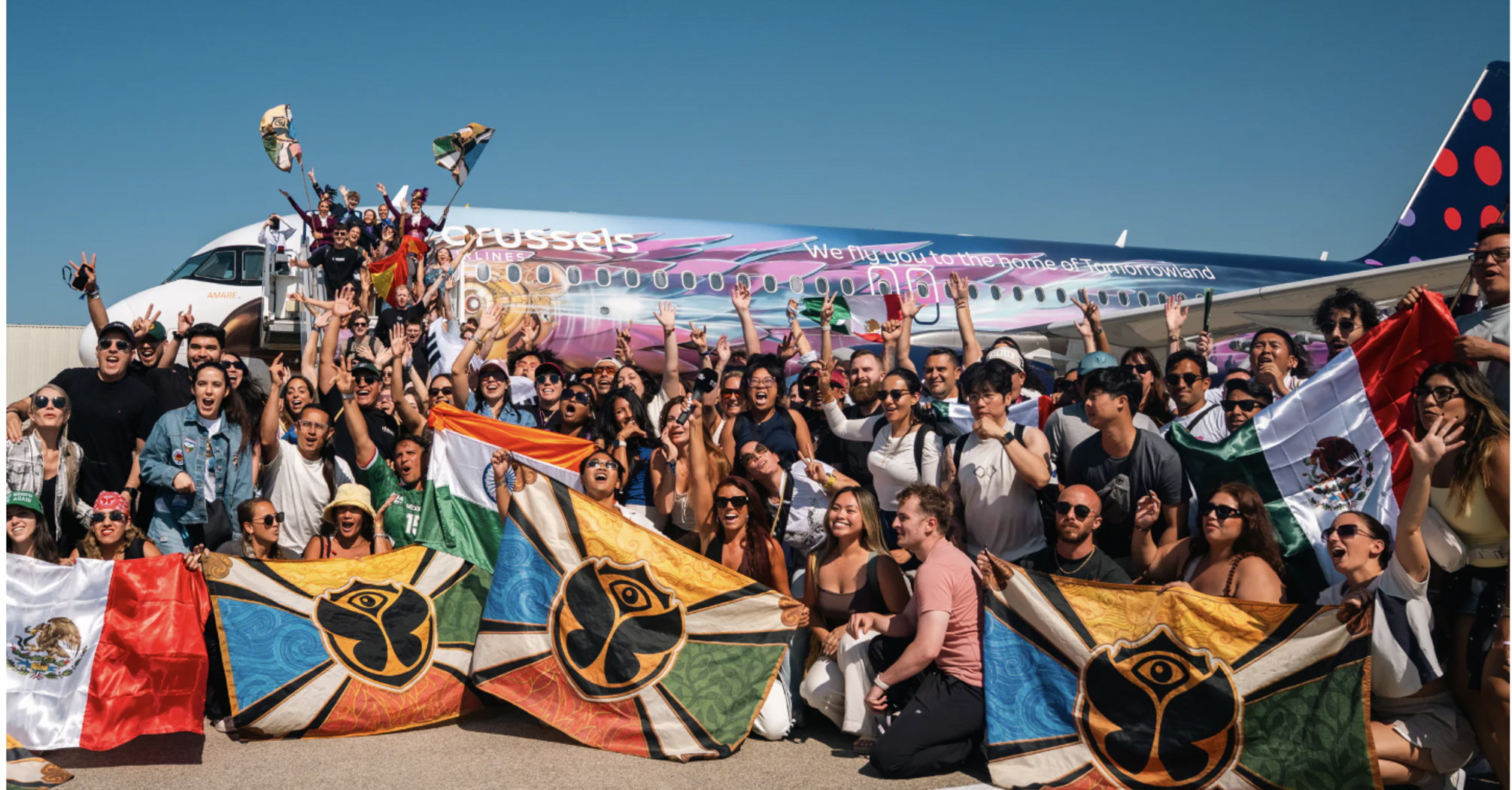 Tomorrowland travellers arrive on a Brussels Airlines Party Flight