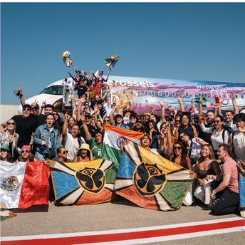 Tomorrowland travellers arrive on a Brussels Airlines Party Flight