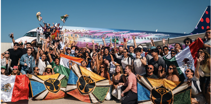 Tomorrowland travellers arrive on a Brussels Airlines Party Flight