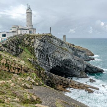 Lighthouse on the rocky Santander coastline