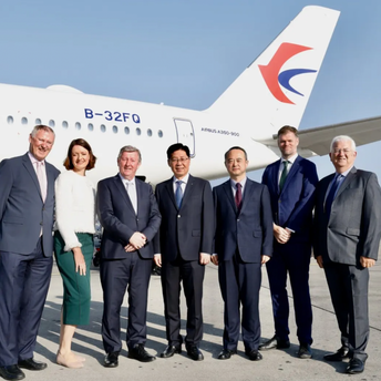Officials beside a China Eastern Airbus A350