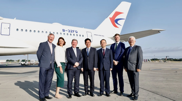 Officials beside a China Eastern Airbus A350