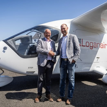 Representatives beside a Loganair-branded ALIA CX300