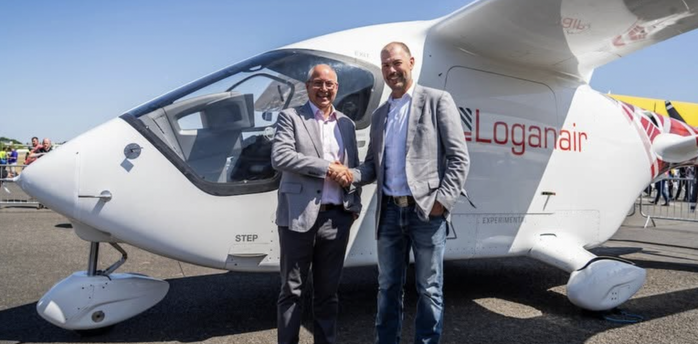 Representatives beside a Loganair-branded ALIA CX300