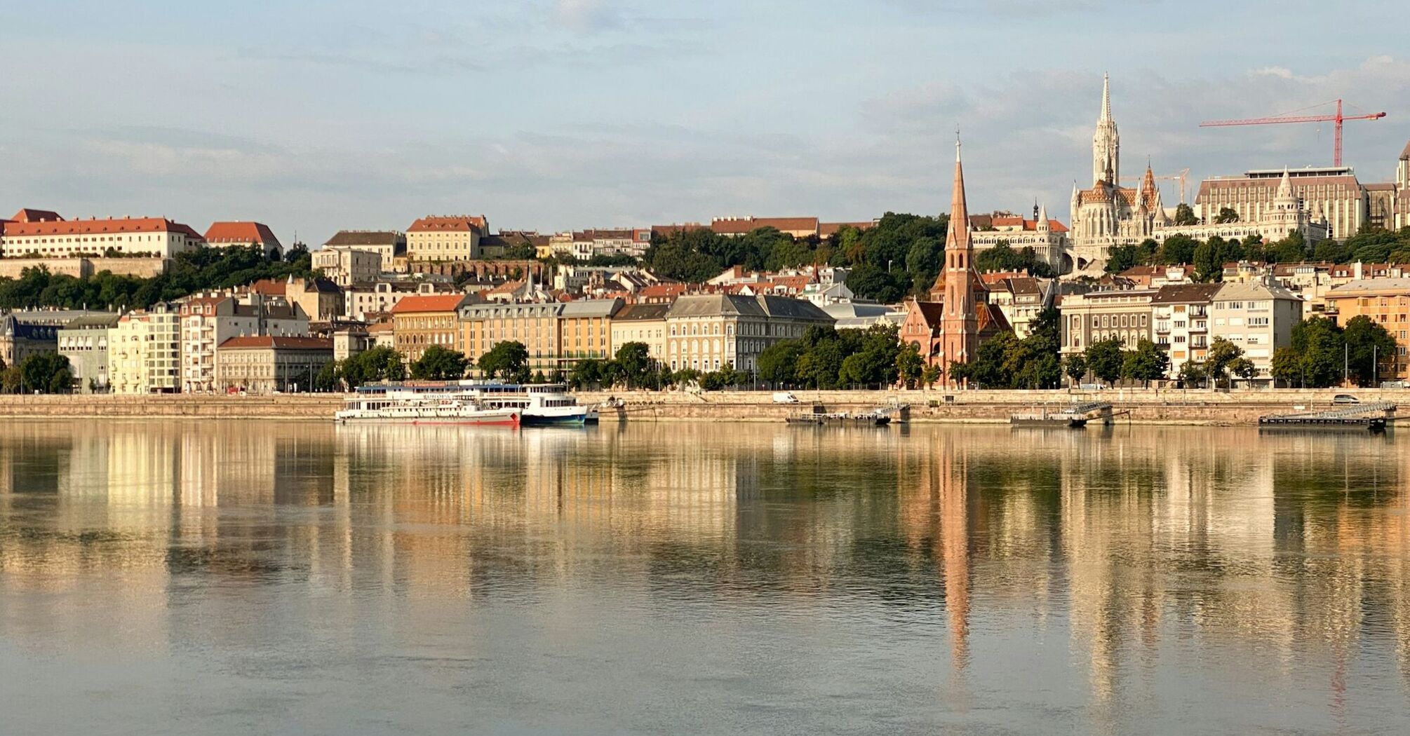 Cruise boats beside Budapest’s Buda riverfront