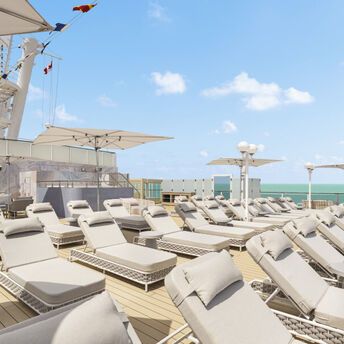 Adults-only cruise ship sun deck with loungers