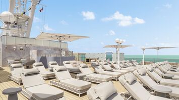 Adults-only cruise ship sun deck with loungers